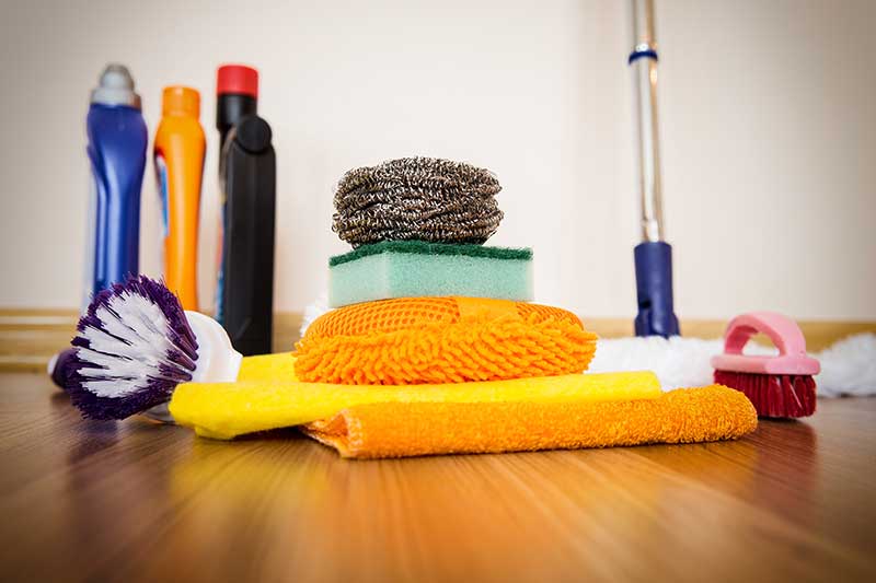 pile of abrasive cleaning supplies